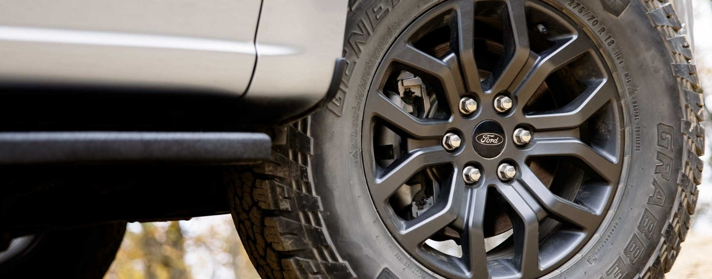 Black wheel on a white 2024 Ford F-150 Tremor